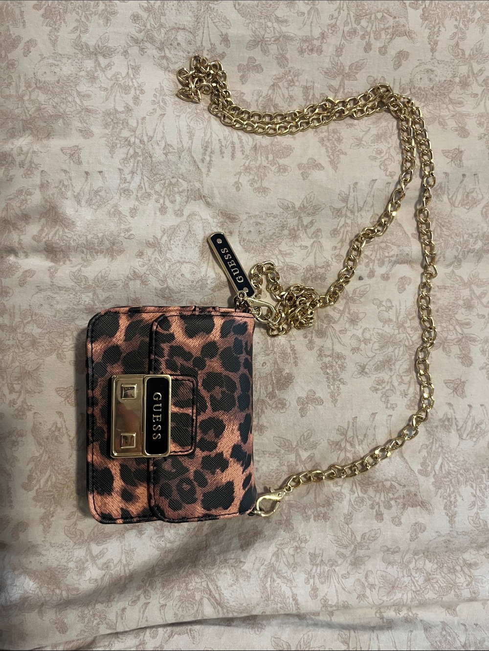 GUESS Leopard-Print Mini Crossbody in Brown and Black with Gold Hardware